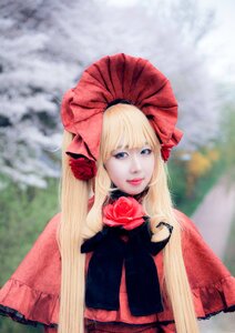 Rating: Safe Score: 0 Tags: 1girl bangs blonde_hair blue_eyes blurry blurry_background bow depth_of_field dress flower lips long_hair looking_at_viewer photo realistic red_dress red_flower red_rose rose shinku solo User: admin