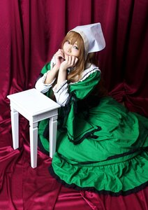 Rating: Safe Score: 0 Tags: 1girl brown_hair chin_rest curtains dress green_dress hat long_hair long_sleeves solo suiseiseki User: admin