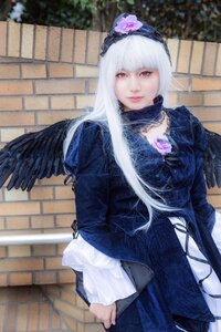 Rating: Safe Score: 0 Tags: 1girl bangs blurry blurry_background brick_wall closed_mouth depth_of_field dress hairband lips long_hair long_sleeves looking_at_viewer outdoors photo red_eyes solo standing suigintou white_hair wings User: admin