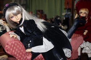 Rating: Safe Score: 0 Tags: 2girls black_dress blurry depth_of_field doll dress frills gothic_lolita hairband long_hair long_sleeves multiple_girls photo silver_hair solo suigintou User: admin