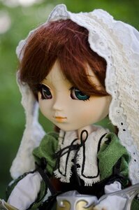 Rating: Safe Score: 0 Tags: 1girl bangs blurry bonnet brown_hair closed_mouth depth_of_field doll eyelashes frills green_dress hat lace lips long_sleeves looking_at_viewer solo suiseiseki upper_body User: admin