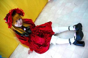 Rating: Safe Score: 0 Tags: 1girl blonde_hair blue_eyes bow dress flower lips long_hair red_dress rose shinku shoes sitting solo User: admin