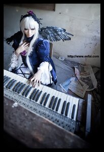 Rating: Safe Score: 0 Tags: 1girl black_border dress electric_guitar feathers flower guitar instrument keyboard_(instrument) letterboxed lips long_hair music piano rose sheet_music silver_hair sitting solo suigintou wings User: admin