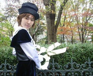 Rating: Safe Score: 0 Tags: 1girl brown_hair day hat long_sleeves looking_at_viewer outdoors short_hair skirt smile solo souseiseki tree User: admin