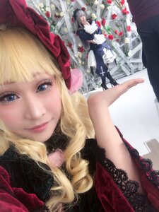 Rating: Safe Score: 0 Tags: 2girls blonde_hair blue_eyes dress flower hat lips lolita_fashion long_hair looking_at_viewer multiple_girls shinku smile solo User: admin