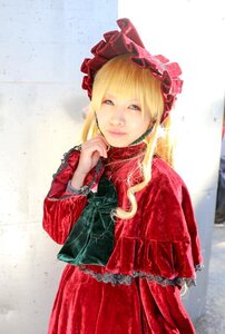 Rating: Safe Score: 0 Tags: 1girl bangs blonde_hair blue_eyes bonnet closed_mouth dress jewelry long_hair long_sleeves looking_at_viewer photo red_dress shinku smile solo User: admin