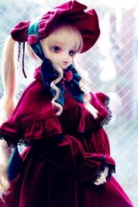 Rating: Safe Score: 0 Tags: 1girl blonde_hair blue_eyes bonnet bow capelet doll dress expressionless flower hat long_hair long_sleeves looking_at_viewer red_dress rose shinku solo standing twintails User: admin