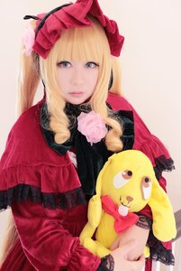 Rating: Safe Score: 0 Tags: 1girl blonde_hair blue_eyes bonnet bow dress flower lips long_hair looking_at_viewer photo red_dress rose shinku solo User: admin