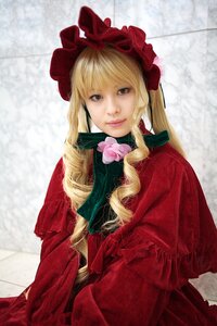 Rating: Safe Score: 0 Tags: 1girl auto_tagged blonde_hair blue_eyes bonnet bow drill_hair flower lips long_hair looking_at_viewer pink_rose rose shinku smile solo User: admin