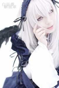 Rating: Safe Score: 0 Tags: 1girl blurry depth_of_field frills hairband long_sleeves looking_at_viewer ribbon silver_hair simple_background smile solo suigintou white_background wings User: admin