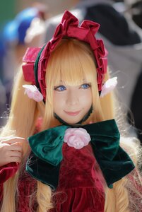Rating: Safe Score: 0 Tags: 1girl bangs blonde_hair blue_eyes blurry blurry_background bonnet bow depth_of_field flower lips long_hair looking_at_viewer red_dress rose shinku smile solo upper_body User: admin
