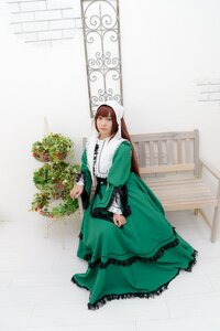 Rating: Safe Score: 0 Tags: 1girl apron brown_hair dress flower green_dress long_sleeves looking_at_viewer solo standing User: admin