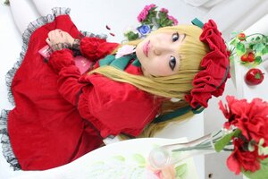 Rating: Safe Score: 0 Tags: 1girl blonde_hair blue_eyes bonnet bow capelet dress flower frills lips long_hair long_sleeves looking_at_viewer pantyhose photo red_dress red_flower red_rose rose shinku sitting solo User: admin