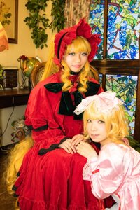 Rating: Safe Score: 0 Tags: 2girls blonde_hair blue_eyes curtains dress flower indoors lips looking_at_viewer multiple_cosplay multiple_girls painting_(object) plant realistic red_dress shinku sitting tagme window User: admin