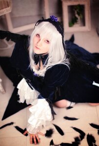 Rating: Safe Score: 0 Tags: 1girl 3d black_dress black_wings blurry blurry_background blurry_foreground depth_of_field dress hairband lips long_hair long_sleeves looking_at_viewer photo red_eyes ribbon silver_hair solo suigintou wings User: admin