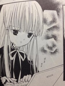 Rating: Safe Score: 0 Tags: 1girl bangs dress eyebrows_visible_through_hair greyscale holding image long_hair long_sleeves looking_at_viewer monochrome neck_ribbon ribbon shinku solo traditional_media upper_body User: admin