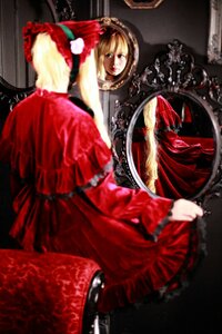 Rating: Safe Score: 0 Tags: 1girl blonde_hair blurry depth_of_field dress long_sleeves mirror red_dress reflection shinku sitting solo User: admin