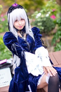 Rating: Safe Score: 0 Tags: 1girl black_legwear blurry blurry_background depth_of_field dress flower frills gothic_lolita hairband lips lolita_fashion long_hair long_sleeves looking_at_viewer photo red_eyes sitting solo suigintou white_hair User: admin