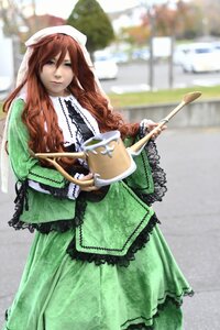 Rating: Safe Score: 0 Tags: 1girl blurry brown_hair depth_of_field dress frills green_dress green_eyes head_scarf holding long_hair long_sleeves looking_at_viewer solo standing suiseiseki watering_can User: admin