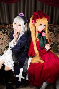 Rating: Safe Score: 0 Tags: 2girls blonde_hair blue_eyes bonnet boots bow curtains dress flower hat lips lolita_fashion long_hair long_sleeves looking_at_viewer multiple_cosplay multiple_girls red_dress rose shinku silver_hair sitting suigintou tagme twintails User: admin
