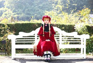 Rating: Safe Score: 0 Tags: 1girl bonnet brown_hair dress flower outdoors red_dress shinku shoes solo tree User: admin