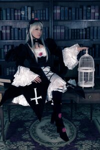 Rating: Safe Score: 0 Tags: 1girl book book_stack bookshelf choker dress flower gothic gothic_lolita hat library lolita_fashion long_hair long_sleeves rose sitting solo suigintou User: admin
