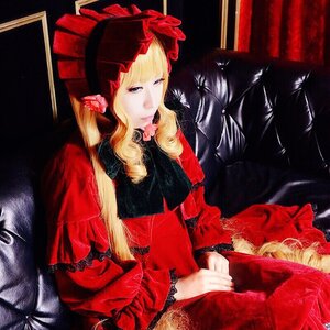 Rating: Safe Score: 0 Tags: 1girl blonde_hair blue_eyes bonnet dress flower long_hair long_sleeves red_dress shinku sitting solo traditional_media User: admin