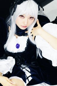 Rating: Safe Score: 0 Tags: 1girl dress flower frills gothic_lolita lips lolita_fashion long_hair long_sleeves looking_at_viewer red_eyes rose solo suigintou white_hair User: admin