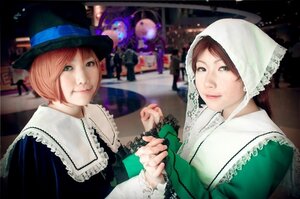 Rating: Safe Score: 0 Tags: 2girls blurry brown_hair depth_of_field dress green_dress green_eyes hat looking_at_viewer multiple_cosplay multiple_girls short_hair sisters smile suiseiseki tagme top_hat upper_body User: admin