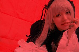 Rating: Safe Score: 0 Tags: 1girl bangs hairband lips long_hair looking_at_viewer nail_polish realistic red_background red_theme ribbon solo suigintou upper_body User: admin