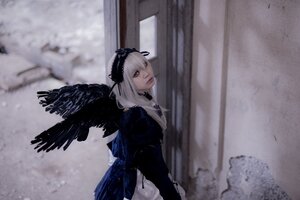 Rating: Safe Score: 0 Tags: 1girl black_ribbon black_wings blurry blurry_background depth_of_field dress feathered_wings feathers frills gothic_lolita hairband lips lolita_fashion long_hair long_sleeves looking_at_viewer ribbon silver_hair solo suigintou wings User: admin