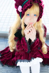 Rating: Safe Score: 0 Tags: 1girl bangs blonde_hair blue_eyes blurry bonnet depth_of_field dress flower frills hands_together lace long_hair long_sleeves looking_at_viewer shinku solo User: admin