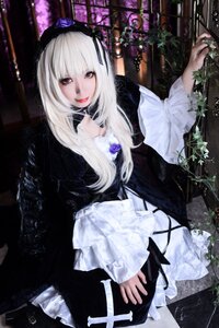 Rating: Safe Score: 0 Tags: 1girl black_dress dress flower frills gothic_lolita hairband lolita_fashion long_hair long_sleeves looking_at_viewer nail_polish red_eyes rose solo suigintou white_hair User: admin