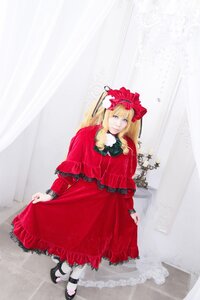 Rating: Safe Score: 0 Tags: 1girl blonde_hair blue_eyes bow dress flower long_hair long_sleeves pantyhose red_dress shinku shoes solo striped User: admin