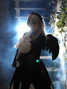 Rating: Safe Score: 0 Tags: 1girl black_dress blonde_hair dress long_hair outdoors solo standing suigintou User: admin