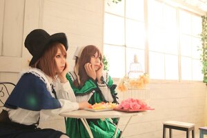 Rating: Safe Score: 0 Tags: 2girls blurry brown_hair chin_rest depth_of_field dress flower hat indoors lips long_hair multiple_cosplay multiple_girls plant sitting table tagme window User: admin