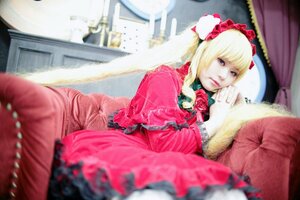 Rating: Safe Score: 0 Tags: 1girl bangs blonde_hair blue_eyes blurry blurry_background blurry_foreground curtains depth_of_field dress flower photo red_dress rose shinku sitting solo User: admin