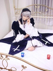 Rating: Safe Score: 0 Tags: 1girl dress flower frills long_sleeves silver_hair sitting solo suigintou wings User: admin