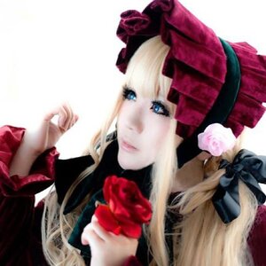 Rating: Safe Score: 0 Tags: 1girl auto_tagged blonde_hair blue_eyes blurry bonnet bow depth_of_field flower hat lolita_fashion long_hair profile red_flower red_rose rose shinku simple_background solo User: admin