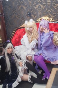 Rating: Safe Score: 0 Tags: 3girls blonde_hair dress frills lolita_fashion long_hair multiple_cosplay multiple_girls silver_hair sitting tagme thighhighs User: admin