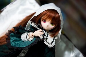 Rating: Safe Score: 0 Tags: 1girl brown_hair doll dress frills green_dress green_eyes heterochromia long_sleeves looking_at_viewer red_eyes solo suiseiseki User: admin