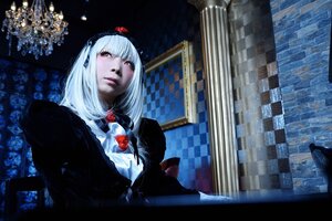 Rating: Safe Score: 0 Tags: 1girl dress flower gothic_lolita hairband indoors lolita_fashion long_hair red_eyes rose solo suigintou User: admin