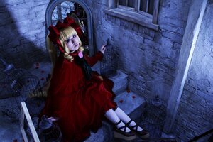 Rating: Safe Score: 0 Tags: 1girl blonde_hair blue_eyes bow doll_joints dress drill_hair flower long_hair long_sleeves red_dress ribbon rose shinku sitting solo twin_drills twintails User: admin