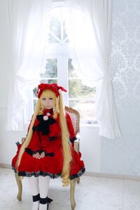 Rating: Safe Score: 0 Tags: 1girl blonde_hair blue_eyes bow curtains dress indoors long_hair long_sleeves looking_at_viewer red_dress shinku solo standing white_legwear window User: admin