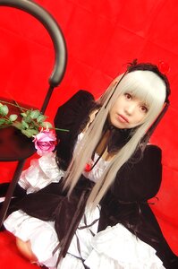Rating: Safe Score: 0 Tags: 1girl bangs dress flower gothic_lolita hairband juliet_sleeves lips lolita_fashion long_hair long_sleeves looking_at_viewer red_background red_eyes rose sitting solo suigintou User: admin