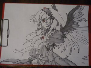 Rating: Safe Score: 0 Tags: 1girl black_border border dress feathers flower frills hairband image long_hair long_sleeves monochrome photo ribbon rose shikishi solo suigintou traditional_media wide_sleeves wings User: admin