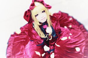 Rating: Safe Score: 0 Tags: 1girl bangs blonde_hair blue_eyes blurry blurry_background blurry_foreground depth_of_field dress flower long_hair long_sleeves looking_at_viewer motion_blur petals red_dress rose shinku smile solo User: admin