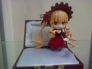 Rating: Safe Score: 0 Tags: 1girl blonde_hair blue_eyes bonnet bow chibi doll dress flower in_box in_container long_hair long_sleeves photo red_dress rose shinku solo traditional_media twintails User: admin