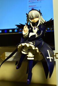 Rating: Safe Score: 0 Tags: 1girl black_wings boots detached_collar doll dress frills full_body hairband knee_boots long_hair long_sleeves looking_at_viewer ribbon rose silver_hair sitting solo suigintou wings User: admin