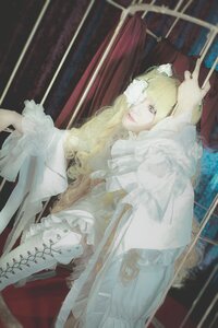 Rating: Safe Score: 0 Tags: 1girl blonde_hair curtains dress flower frills hair_flower hair_ornament kirakishou long_hair solo wide_sleeves User: admin